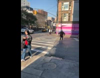 Cameraman run film red car turn on street