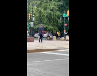 Collab WINY - Man ride bike carry sofa on street