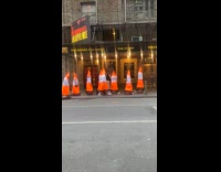 Collab winy - Group of people in cone costume walk street