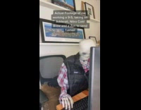Skeleton works from home on computer