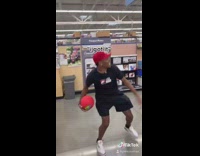 Guy throws red ball friends run away