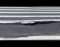 Collab WINY - Low key sink hole on pedestrian crossing