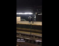 man by himself dances on subway station