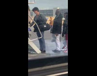 Woman film dance tiktok before boarding plane