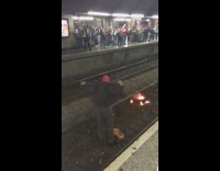 Collab Subway Creatures - Guy on train subway tracks spiderman costume fire grill security tackle