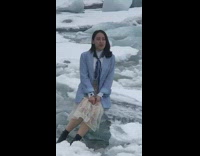 Woman skirt picture on ice glacier snow