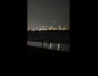 Woman bikini pose beach shore with flash