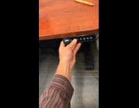 Man with lowered desk lowers his position