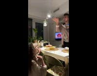 Guy screaming dodging swinging light in kitchen 