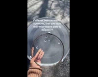 Woman walk outside hold steal microwave plate