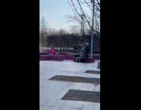 Woman purple onesie lay over purple blocks