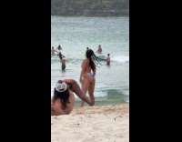 Woman in bikini twerks for beach video Part 2