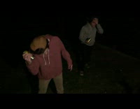 NSFW guy in red sweater and guy in grey sweater painfully try to smash beer can on head