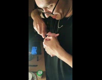 Toy Pig Inhales vape smoke and man squeezes it out