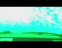 Filmer inside car in a drive thru car wash