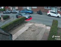 Person backs up into driveway 