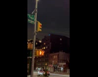 People playing with lightsabers on rooftop