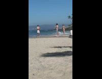 Guy fail backflip land on head beach