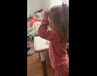 Woman asking toddler if she farted