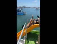 Friends try to push guy head first down slide fail 