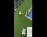 Neon green floatie girl edge of pool butt