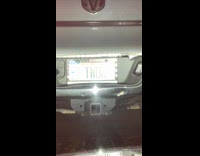 Man reading twuck license plate 