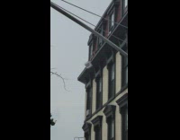 Collab Winy - Police officer grabs air conditioner hanging off ledge