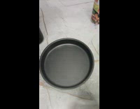 Egg cooked on pan over strong flashlight