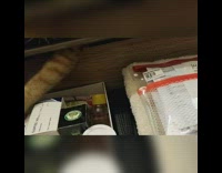 Orange kitten gets stuck in drawer 
