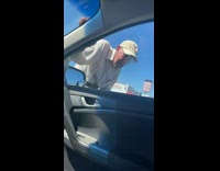 Old man tries to get into wrong car 