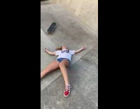 Girl rides skateboard down ramp fail skatepark 