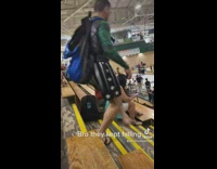 People tripping and falling on bleacher stairs 