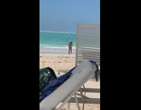 couple hug selfie stick beach