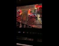 Collab winy - Firetrucks with extended ladder towards building rooftop