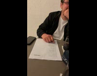 Couple plays magic quiz from hotel balcony