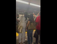 People yell at cops and firefighters to help up guy on train tracks 