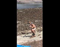 Guy pretends to be bird in ocean