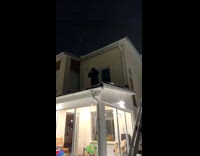 Man jump flip from roof to snow