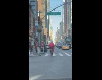 Man santa costume ride bike on street