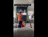 Guy watches summer house while at work