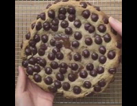 Giant Chocolate Chip With Caramel Broken in Half