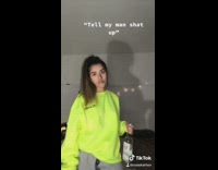 Pink shirt girl jumps changes green sweater 