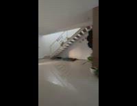 Girl with VR headset runs into wall 