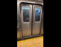 Kid with backpack squeezes into crowded subway 