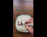 Writing leave in white cream bowl 