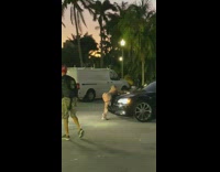 Woman butt bend over black car straps