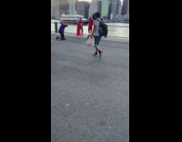 A couple maternity shoot all red outfits river