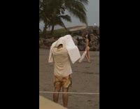 Collab IITW - Woman bikini poses at the rainy beach