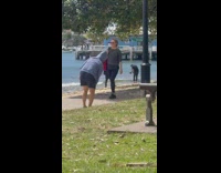 Man in black open polo music video shoot at the beach Part 1