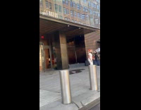 Man foot tap dance in front building